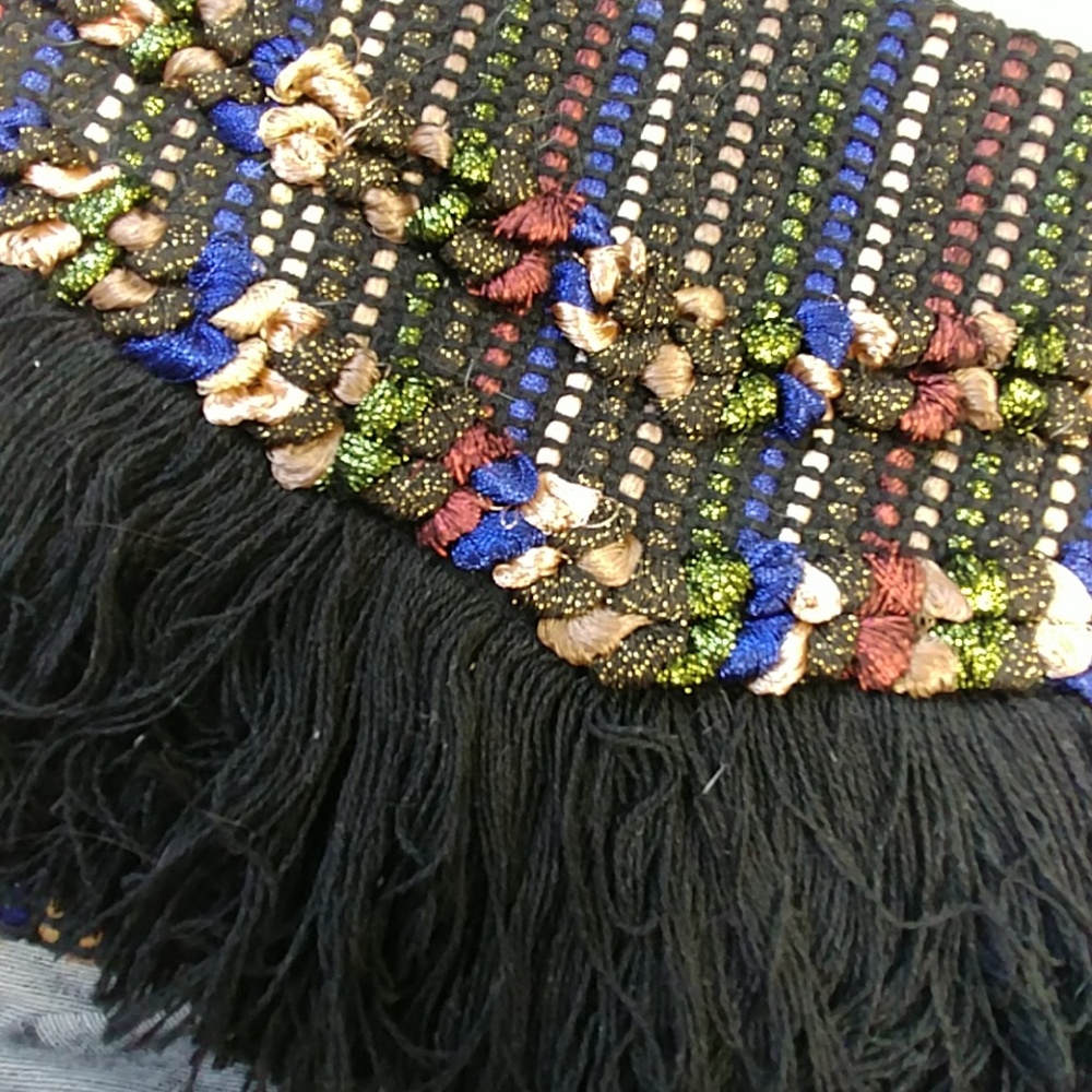 Taj metallic clutch
